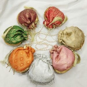 Fancy banarasi clutch for wedding parties traditional potli gol bag
